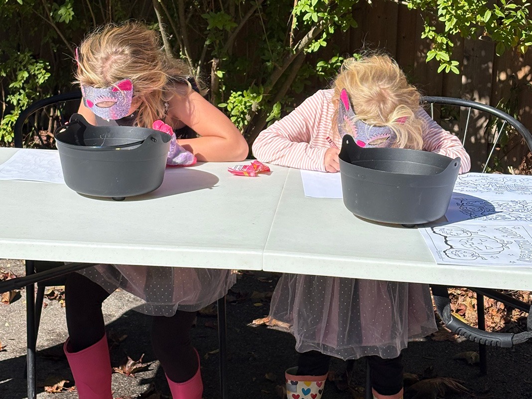 Kids colouring at Pumpkin Fest hosted by the Elaine Jones Group.